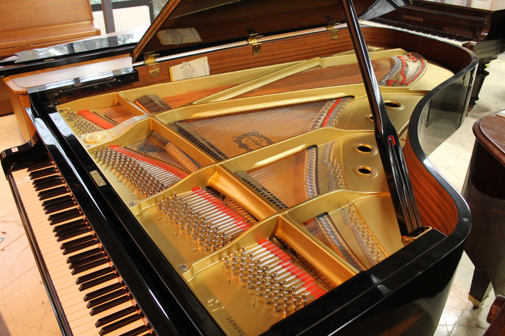 Yamaha (c1984) A 7ft 6in Model C7 grand piano in a bright ebonised case on square tapered legs. - Image 2 of 5