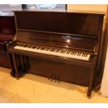Yamaha (c2004) A Model U3SN upright piano in a bright mahogany case. AMENDMENT Is in a walnut case.