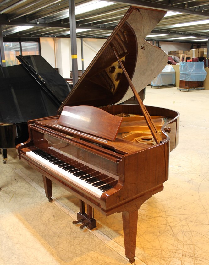 August Förster (c1986) A 5ft 7in grand piano in a bright mahogany case on square tapered legs;