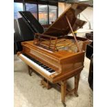 Blüthner (c1906) A 6ft 3in grand piano in a satin and boxwood strung case on dual square tapered