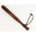 A 19th Century turned wooden police truncheon,