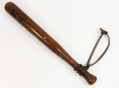 A 19th Century turned wooden police truncheon,