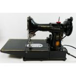 A Singer 222K Electric Sewing Machine, with original box,