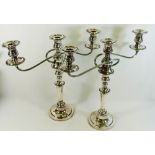 A large pair of silver plate on copper twin branch, three light candleabra,