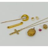 A 9 carat gold bar brooch, and a gold horseshoe stick pin, combined weight 5g,