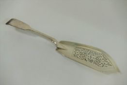 A Victorian silver fiddle pattern fish slice, London 1838, with pierced and reeded decoration, 30.