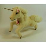 A modern limited edition Steiff unicorn, with ear tag and certificate numbered 00366 (of 1500),