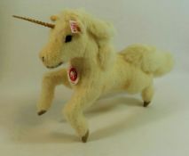 A modern limited edition Steiff unicorn, with ear tag and certificate numbered 00366 (of 1500),