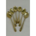 Set of six George III silver gilt teaspoons, London 1795, with shell bowls, combined weight 2.