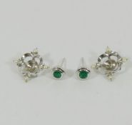 A pair of 18 carat white gold emerald and seed pearl earrings by Cassandra Goad,