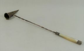 A late Victorian conical candle snuffer, with mother of pearl handle and silver mounts,