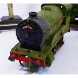 A Hornby OO gauge green clockwork LNER train and tender, numbered 2810, with other rolling stock,