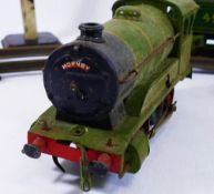 A Hornby OO gauge green clockwork LNER train and tender, numbered 2810, with other rolling stock,