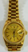 A 1980's 18 carat gold Rolex Oyster perpetual day date wrist watch,
