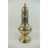 A George IV silver sugar caster, of baluster form with stepped circular foot, London 1822,
