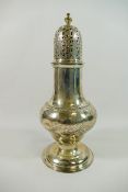A George IV silver sugar caster, of baluster form with stepped circular foot, London 1822,