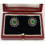 A pair of yellow metal, emerald and enamel flower head earrings,