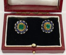 A pair of yellow metal, emerald and enamel flower head earrings,