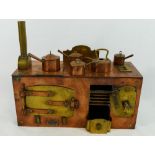 A miniature copper and brass Victorian style range, 25.