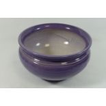 A Bretby pottery bowl, with purple glaze,