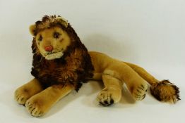 A modern Steiff recumbent lion 'Leo',