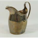 A George III silver cream jug with reeded handle, London 1800, maker's mark rubbed, 12.5cm high, 4.