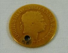 A George III sovereign, 1817, with drilled hole, 7.