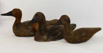 Three late 19th/early 20th century painted pine decoy ducks,