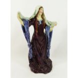 An early 20th century pottery figure of Ellen Terry playing Lady Macbeth,