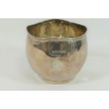 A small George V circular silver sugar bowl, with wavy reeded rim, 6.2cm high, 2.71ozt, 84.