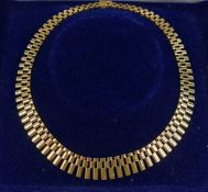 A 9 carat gold fringe necklace, Birmingham 1976, 43cm long, 42.