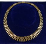 A 9 carat gold fringe necklace, Birmingham 1976, 43cm long, 42.