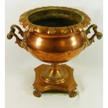 A 19th century two handled copper urn, converted from a samovar, raised on square base,