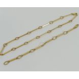 A yellow metal necklace and bracelet, with circular and bar links, the clasps stamped '375',