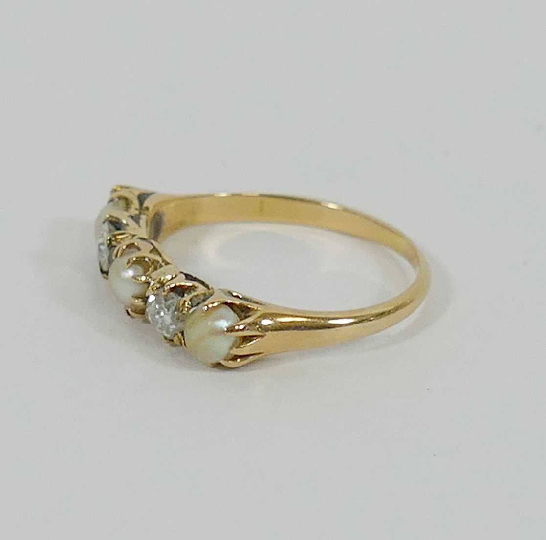 A yellow metal pearl and diamond five-stone ring, the two old cut diamonds approximately 0. - Image 2 of 4