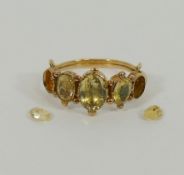 A Victorian gold and citrine five stone ring,