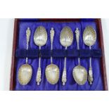 A set of six silver apostle spoons with shell bowls, Birmingham 1907, 1.16ozt, 36.