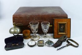 Assorted miscellaneous items including a corkscrew, Georgian glasses, a silver plated bell, coins,