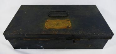 A tin box with brass plaque inscribed 'HHR White Esq, Kings Royal Rifles',