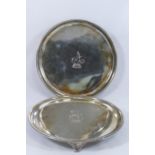A pair of George III circular silver card trays, London 1786 by John Crouch I and John Hannam,