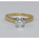 A diamond single stone ring, the round brilliant cut diamond approximately 0.