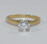 A diamond single stone ring, the round brilliant cut diamond approximately 0.