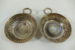 Two George V cast silver taste du vins, London 1918, 9.2cm diameter, combined weight 7.3ozt, 227.