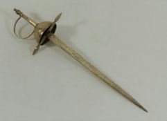 A paper knife, in the form of a sword, stamped 'SILVER', 19.5cm long, 1.14ozt, 35.