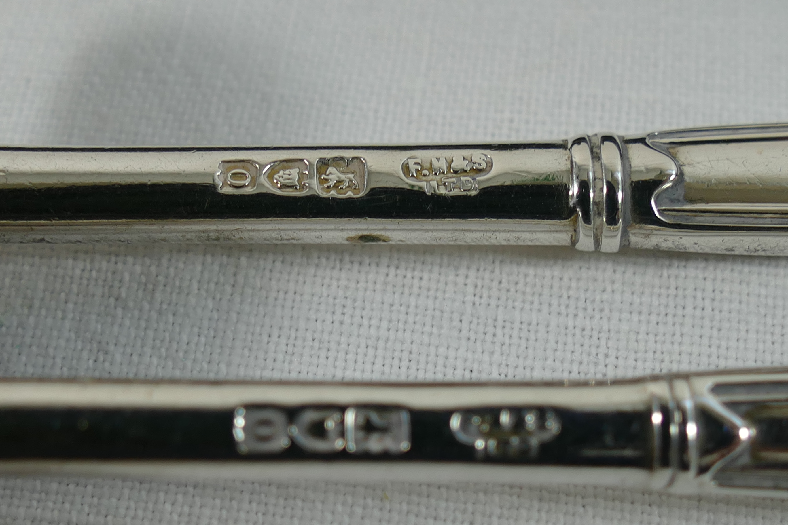 An Edwardian silver pusher and spoon, with flared reeded terminals, London 1909, - Image 2 of 2