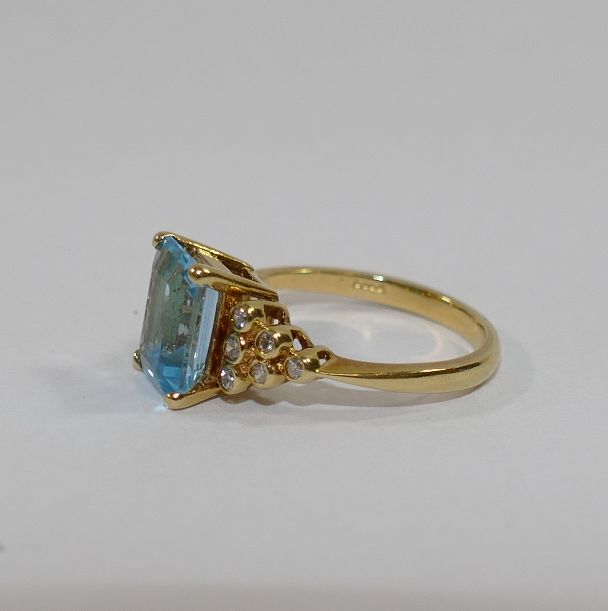 An 18 carat gold blue topaz and diamond ring, - Image 2 of 2