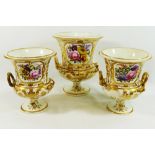 A garniture of three early 19th century Derby porcelain two-handled vases, of campagna form,