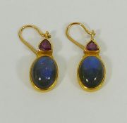 A pair of yellow metal labradorite and garnet yellow metal drop earrings, 3.