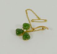 A yellow metal jadeite and seed pearl set clover leaf brooch, stamped '9C', 3.