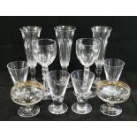 Three panel cut champagne flutes, 17cm high, two small silver overlayed glass pedestal bowls,